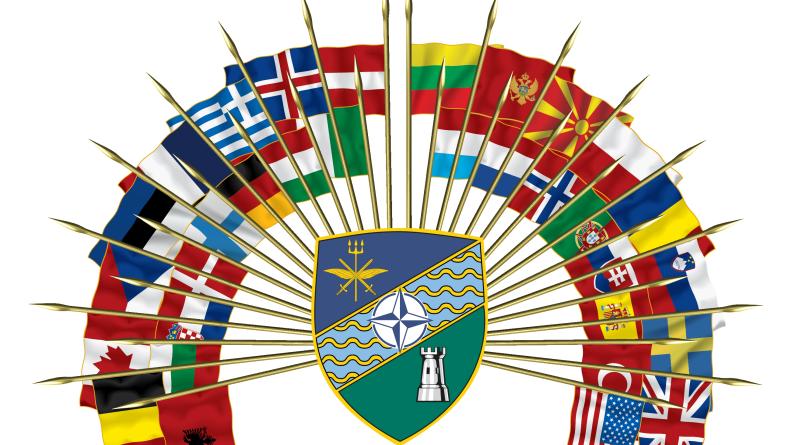 Blason du MARCOM avec les 32 pavillons alliés